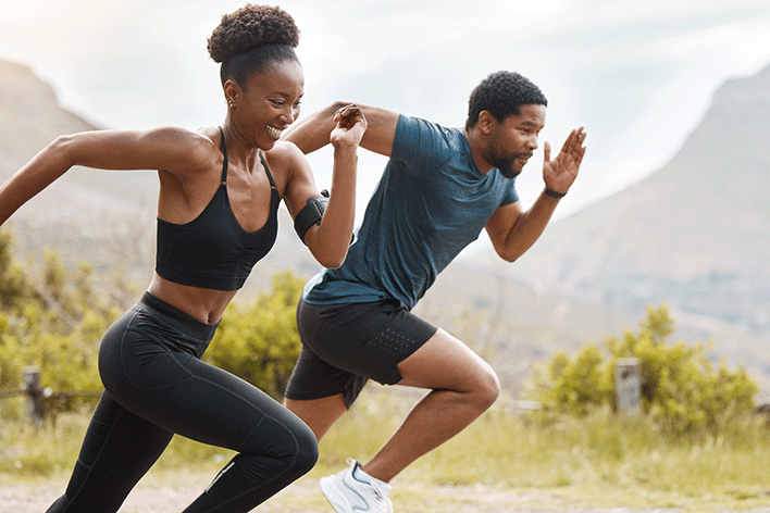 black-couple-running-after-taking-protein-powder