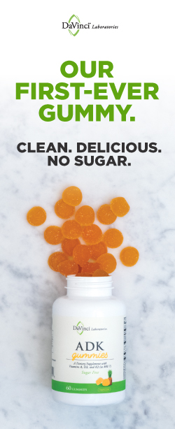 Brightly colored orange multivitamins spilling playfully out of a bottle labeled ADK Gummies. Text overlay reads 