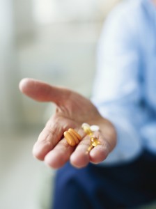 Man-holding vitamins