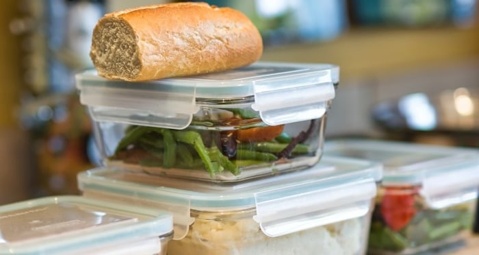 close-up-of-containers-of-leftovers-stacked-on-kitchen-counter-meal-food-indoors-bread-lunch_t20_7mXJg7 (1)